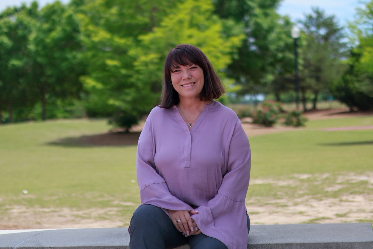 Beth Ali smiling outdoors